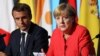 French President Emmanuel Macron (left) and German Chancellor Angela Merkel have come out in support of the Iran nuclear deal. (file photo)