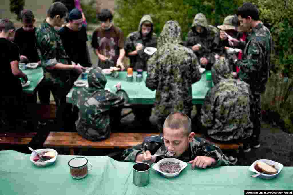 Ukrainian photographer Andrew Lubimov was selected for this image taken in a children&#39;s military-patriotic camp in Crimea.