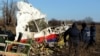 Уламки літака на місці його збиття готують до перевезення до Нідерландів, окупована частина Донеччини біля села Грабового, фото 20 листопада 2014 року