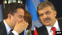 Turkish President Abdullah Gul (right) with Foreign Minister Ali Babacan (file photo)