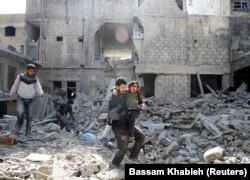 Pamje të civilëve të plagosur në Ghouta