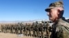 U.S. Army General John Nicholson, the commander of Resolute Support forces and U.S. forces in Afghanistan, speaks with Afghan police special forces in the southeastern Logar province on November 30.
