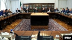 Officials at a meeting of the High Council of Coordination for Economy. President Hassan Rouhani (middle), Head of Judiciary Sadegh Larijani (left) and Speaker of Parliament, Ali Larijani (right) 2018.