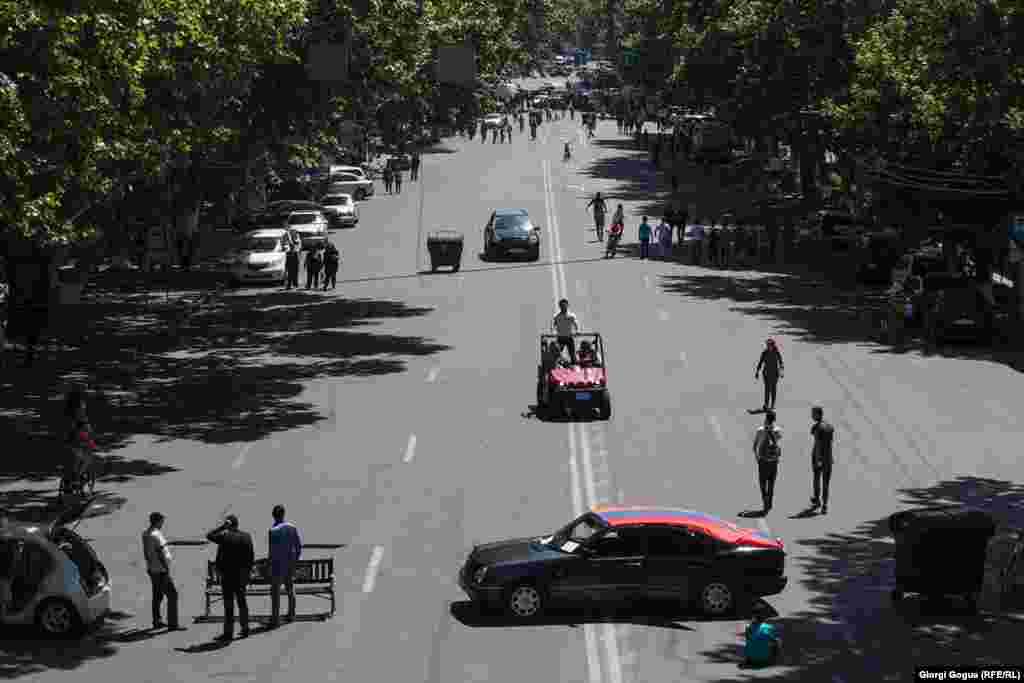 Many streets in the Armenian capital were mostly empty on May 2 as protesters used benches and cars to block traffic.