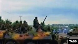 An armoured vehicle on a street in Osh.