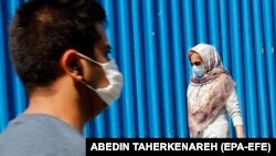 IRAN PANDEMIC CORONAVIRUS COVID19 -- Iranians wearing face masks go shopping around Tehran's grand bazaar in Tehran, Iran, 07 July 2020. Media reports state on 07 July 2020 