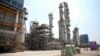 FILE - In this Sept. 4, 2018 file photo, released by an official website of the office of the Iranian Presidency shows a part of the Pardis petrochemical complex facilities in Assalouyeh on the northern coast of the Persian Gulf, Iran. Bijan Zanganeh, Ira