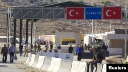 The move comes after fighters from the Islamic Front took control of rebel bases at the Bab al-Hawa crossing on Syria's northwestern border with Turkey.