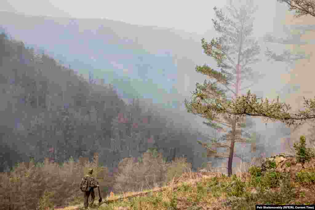 Smoke fills a valley on Olkhon Island.