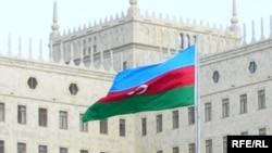 A flag waving in front of the Government House in Baku, Azerbaijan (file photo)