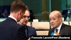 Britain's Foreign Secretary Jeremy Hunt, German Foreign Minister Heiko Maas and French counterpart Jean-Yves Le Drian attend a meeting at the European Council in Brussels, Belgium, May 13, 2019.