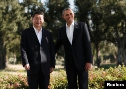 Hszi Csin-ping kínai és Barack Obama amerikai elnökök a kaliforniai Rancho Mirage-ban 2013. június 7-én