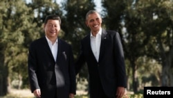 Chinese President Xi Jinping (left) and U.S. President Barack Obama at a meeting in California on June 7