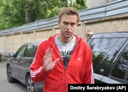Aleksei Navalny as he leaves a detention center in Moscow on June 14.