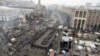 Pro-European-integration protesters spell out the Ukranian word "lustration" on Independence Square in Kyiv on December 19.