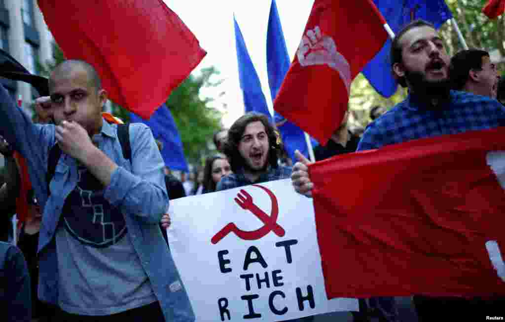 Students march during a May Day rally in Tbilisi, Georgia, on May 1. (Reuters/David Mdzinarishvili)