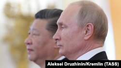 Си Цзиньпин и Владимир Путин (архивное фото)