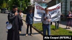 Ghenadie Valuta (left) has organized several anti-LGBT marches in Moldova.