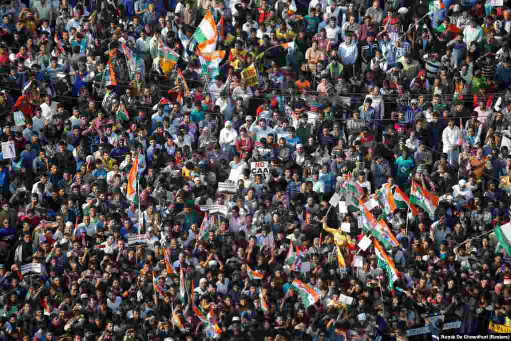 Supporters of Mamata Banerjee, the Chief Minister of West Bengal, attend a protest march against the new citizenship law, in Kolkata, on December 18.