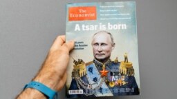 "Aq patşanıñ oraluı" degen maqala jariyalağan Economist jurnalınıñ mwqabası. Franciya, Strasburg. 28 qazan, 2017 jıl