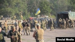 Українські військові після бою під Старогнатівкою, 10 серпня 2015 року (Фото - начмед «Госпітальєрів» Яна Зінкевич