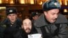 Russian Activist Charged With Assault