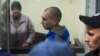 УКРАИНА – Рускиот војник Вадим Шишимарин во судница, кому во Украина му се суди за убиство на цивил 