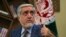 Afghan presidential candidates Abdullah Abdullah gestures as he speaks during an interview with AFP at the Sapedar Palace in Kabul on November 5.
