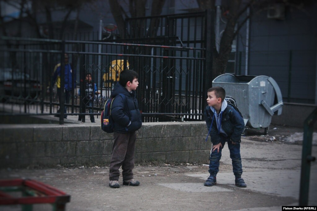 Schoolkids on the street in Fushe-Kosove, photographed by Flakon Zharku. The 17-year-old says he studied the requirements of the photo project carefully and decided to photograph the neighborhood around his house.