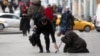RUSSIA -- beggar woman begs for alms on Tverskaya street in downtown of Moscow, November 20, 2019
