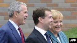 George Bush, Dmitry Medvedev, and Angela Merkel at the G8 summit