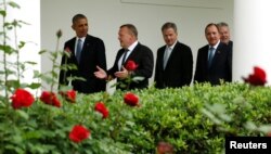 U.S. President Barack Obama (left) escorts Nordic leaders to the Oval Office of the White House in Washington, D.C., on May 13.