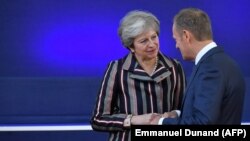 Theresa May și Donald Tusk, octombrie 2018