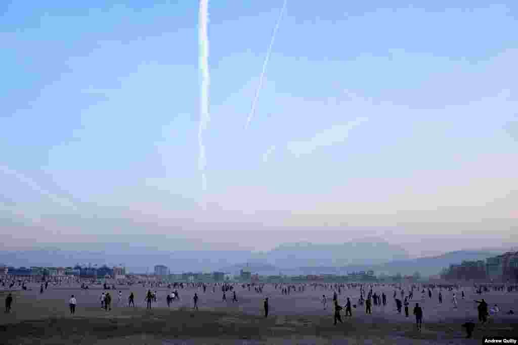 Crowds are one of the main concerns for foreigners in Afghanistan, and Quilty tries to make sure he is never surrounded. It doesn&#39;t always work out, though: Moments after this image was taken, his smartphone was stolen from his pocket in a &quot;textbook mob situation.&quot; When Quilty gave chase, the thieves eventually dropped the phone and he was able to post this image of a Kabul sports field to Instagram.