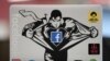 A Facebook sticker is pictured on a laptop at Facebook's