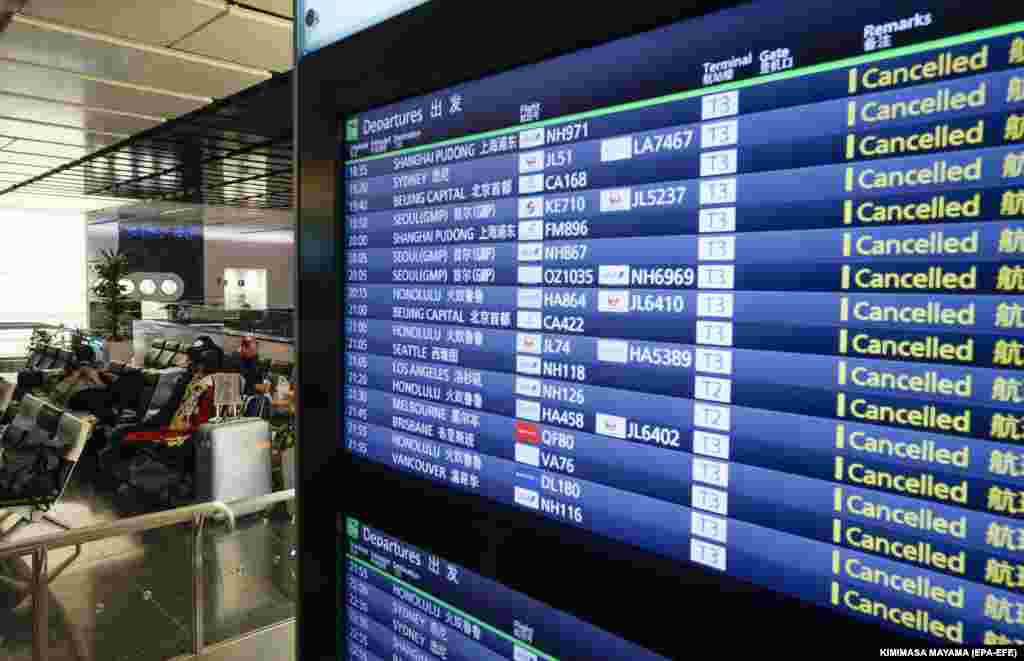 The departures board at Tokyo International Airport on April 14 shows that all flights were canceled.