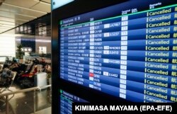 Аэропорт в Токио: все рейсы отменены из-за коронавируса. 14 апреля 2020