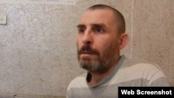 Россиянина Руслана Гаджиева признали виновным в смерти восьми украинских военных