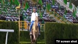 President Gurbanguly Berdymukhammedov was shown on state television riding a horse in front of the crowd.