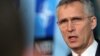 NATO Secretary-General Jens Stoltenberg addresses the media before a meeting at NATO headquarters in Brussels on February 13.