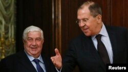 Глава МИД Сирии Валид Муаллем (слева) и министр иностранных дел России Сергей Лавров. Москва, 13 апреля 2017 года.