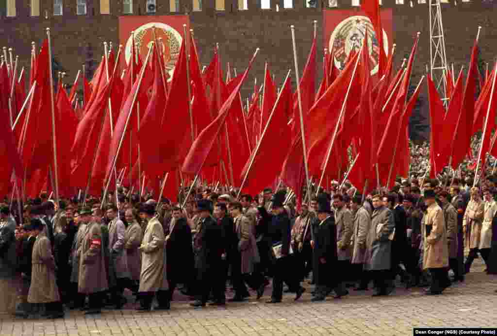 Behind the Iron Curtain: Workers parade through Red Square on May Day in 1964.