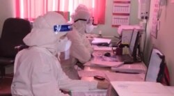 Коронавируспен күреске жұмылдырылған дәрігерлер.