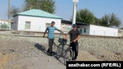 Turkmenistan. Life surrounding the train track in Yoloten district of Mary province.