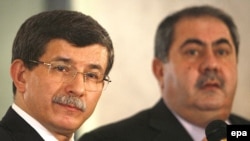 Ahmet Davutoglu (left) was previously chief foreign-policy adviser to Prime Minister Erdogan.