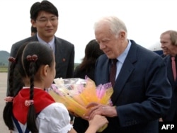 Джиммі Картер у Північній Кореї, на цьому фото під час одних із пізніших відвідин Пхеньяна, 2010 рік