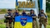 Борците на баталјонот на Националната полиција на Украина „Захид“ по ослободувањето на градот Лиман од руската армија, 2 октомври 2022 година