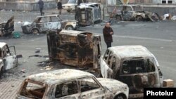 Armenia - Burned cars at the site of deadly clashes between opposition protesters and security forces in Yerevan, 2Mar2008.