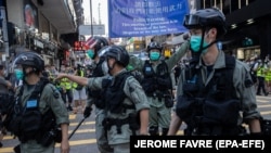 Гонконг жұрты Қауіпсіздік заңына қарсы наразылыққа шыққан кез. 28 маусым 2020 жыл.