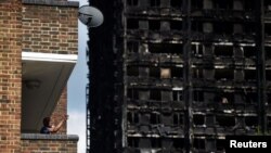 Лондонда өртенген Grenfell Tower ғимараты. Ұлыбритания, 17 маусым 2017 жыл.